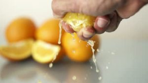 Squeezing an orange