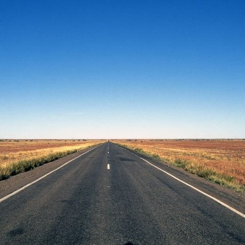 Long straight in the middle of nowhere road represents marketing strategy without any creative